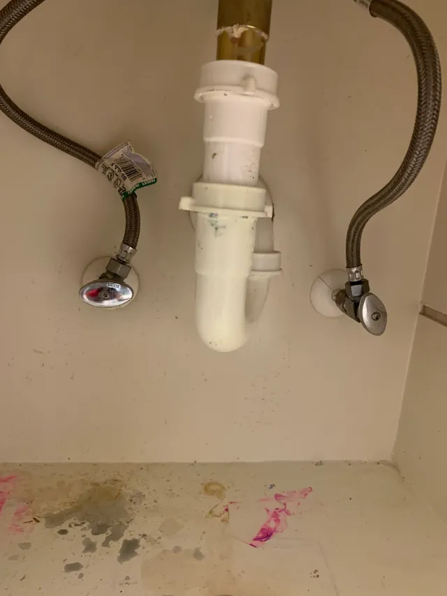 Under-sink drain before correction