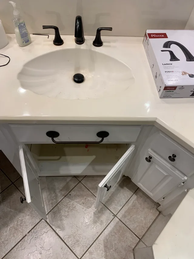 Finished bathroom vanity and faucet installation